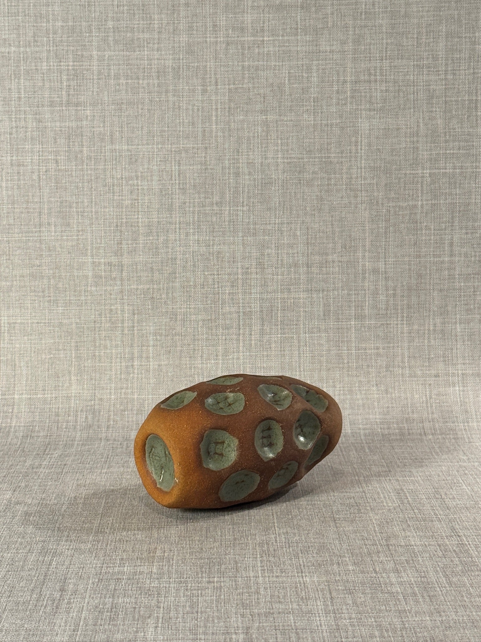 Handmade Terracotta Glazed Studio Pottery Bud Vase with Celadon Impressions. hommes + gardens estudio.