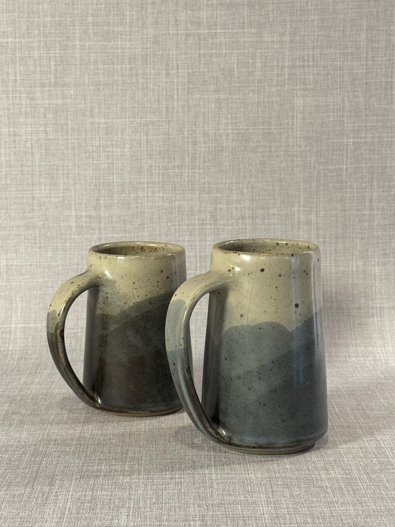 Pair of Artisan Studio Pottery Tree Motif Mugs in Earth-Toned Glaze, Handcrafted Stoneware