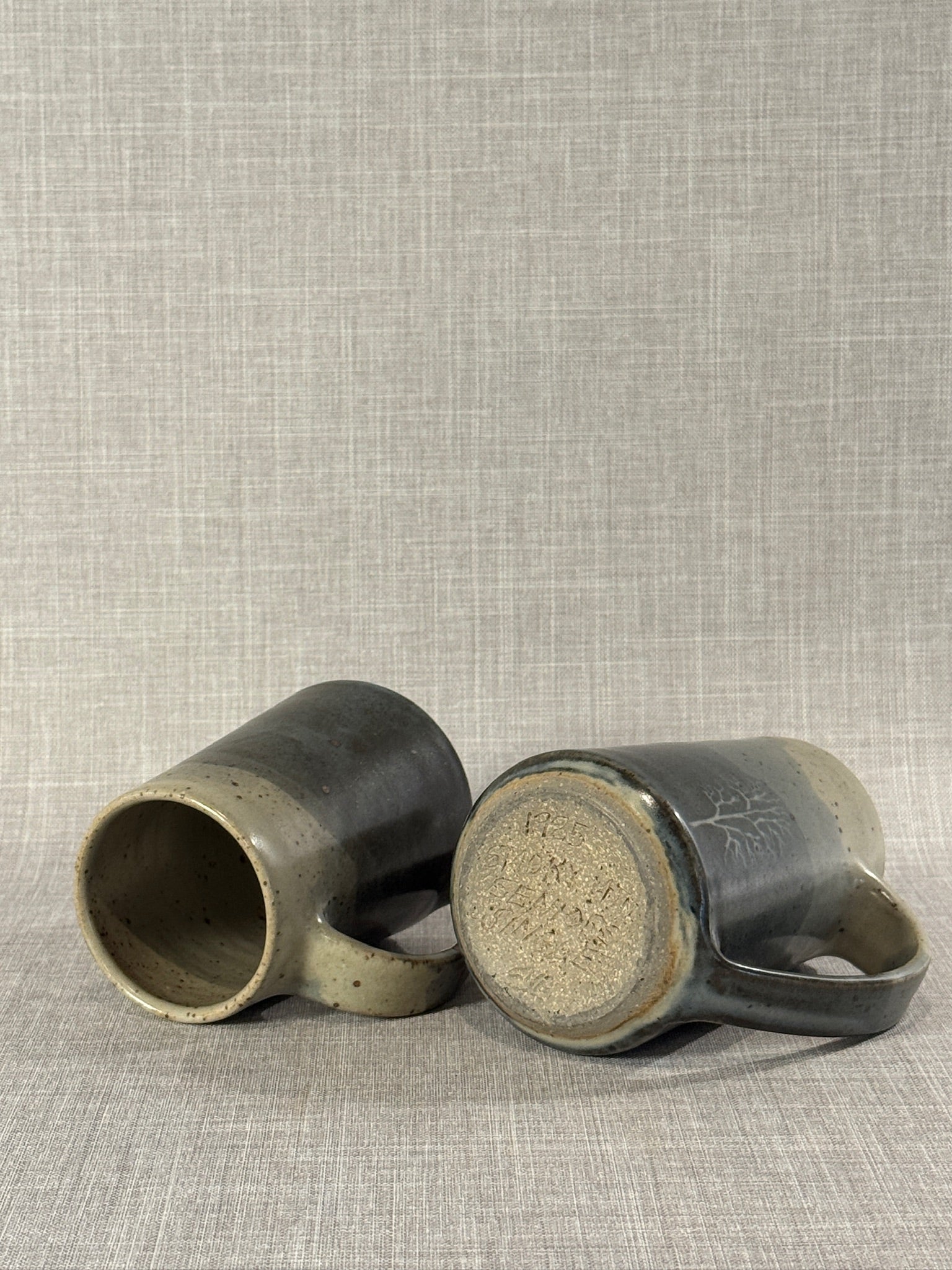 Pair of Artisan Studio Pottery Tree Motif Mugs in Earth-Toned Glaze, Handcrafted Stoneware