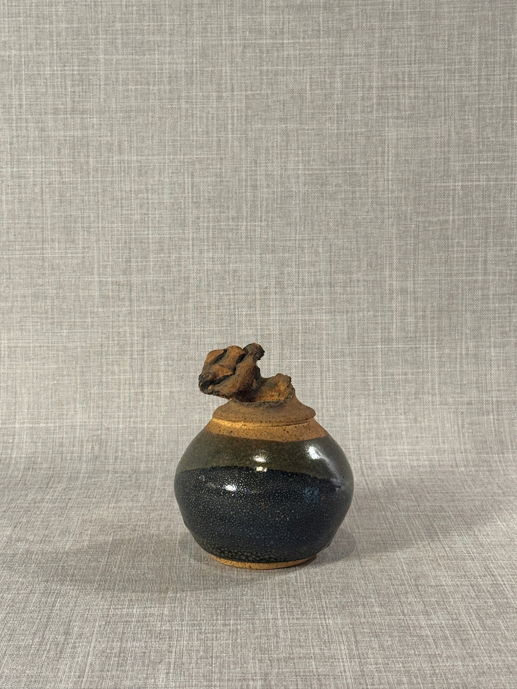 Sculptural Studio Pottery Vessel by Sadek – Textured Black and Earth-Toned Abstract Ceramic Form
