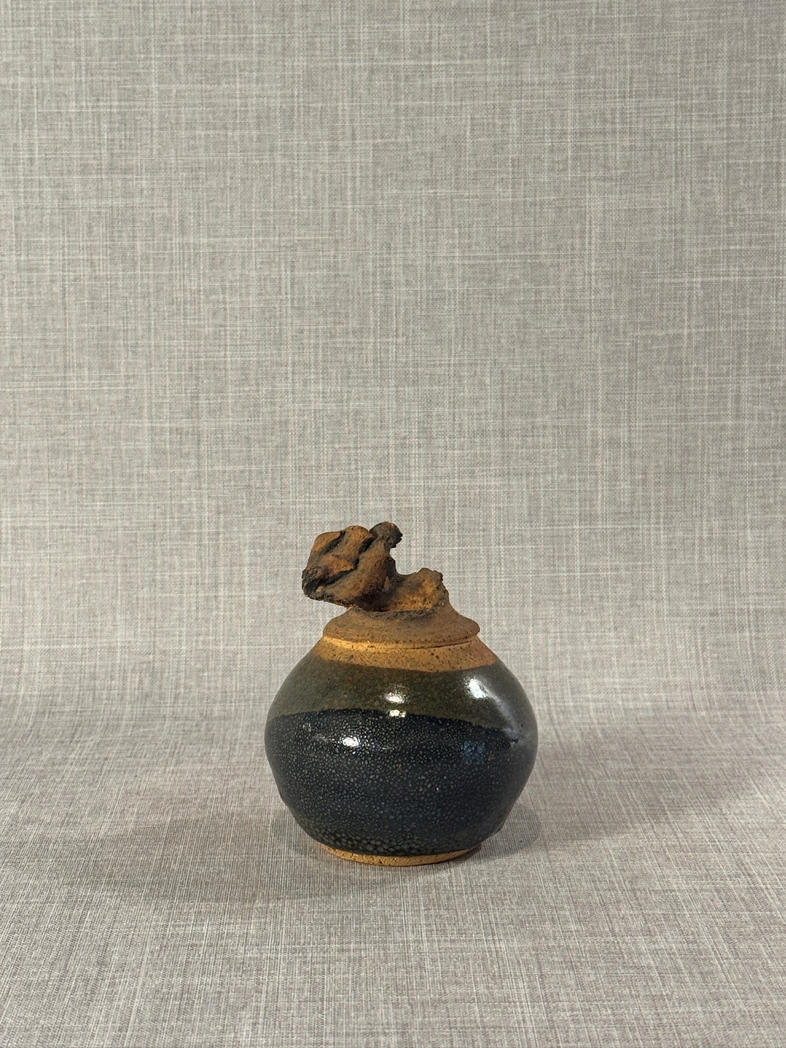 Sculptural Studio Pottery Vessel by Sadek – Textured Black and Earth-Toned Abstract Ceramic Form