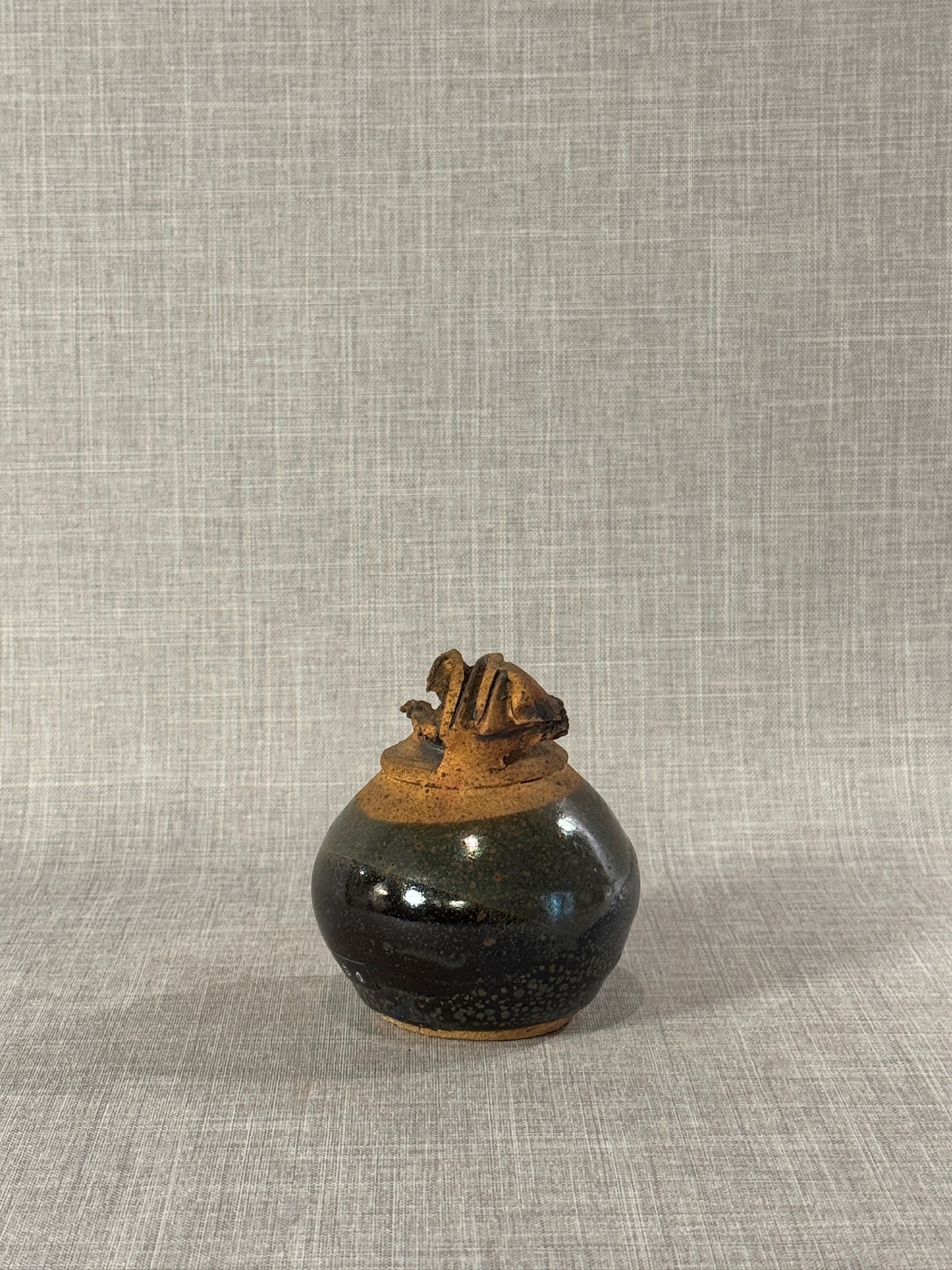 Sculptural Studio Pottery Vessel by Sadek – Textured Black and Earth-Toned Abstract Ceramic Form
