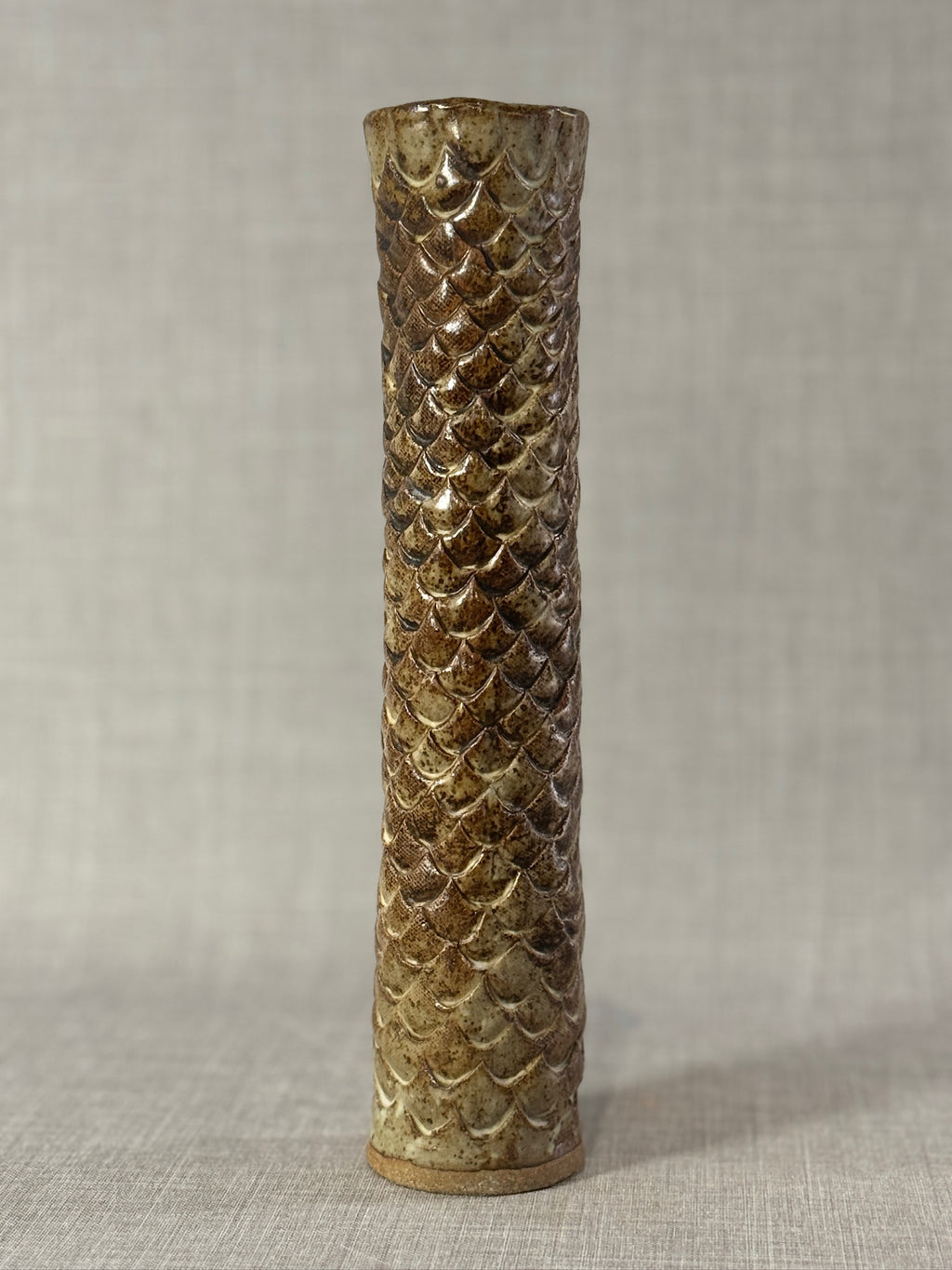 Tall Hand-Glazed Studio Pottery Vase with Fish Scale Relief showcasing a textured ceramic design in earthy glaze tones. hommes + gardens estudio