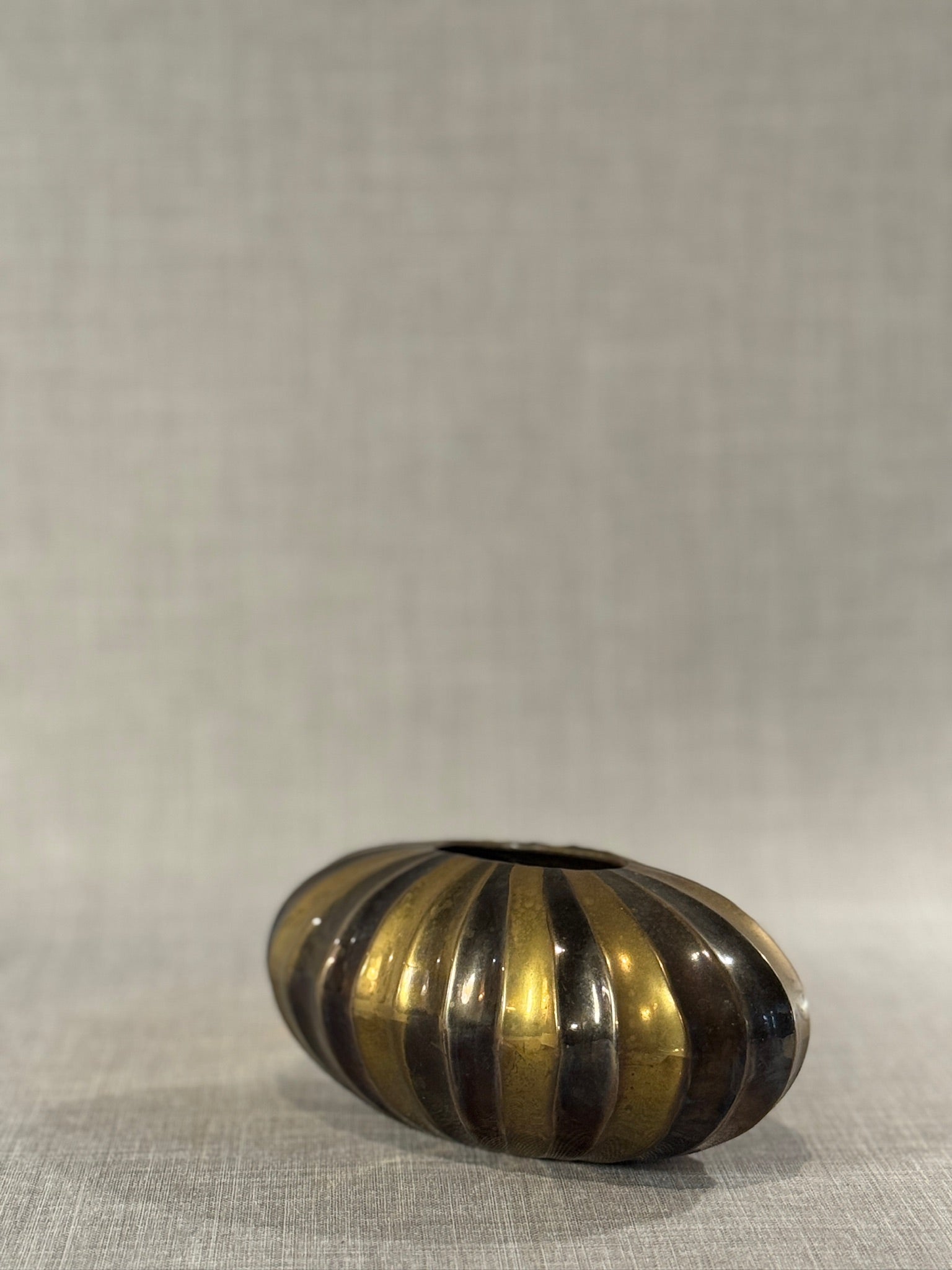 Sculptural Mid-Century Brass and Bronze Ribbed Oval Vase — Handcrafted Modernist Decorative Vessel