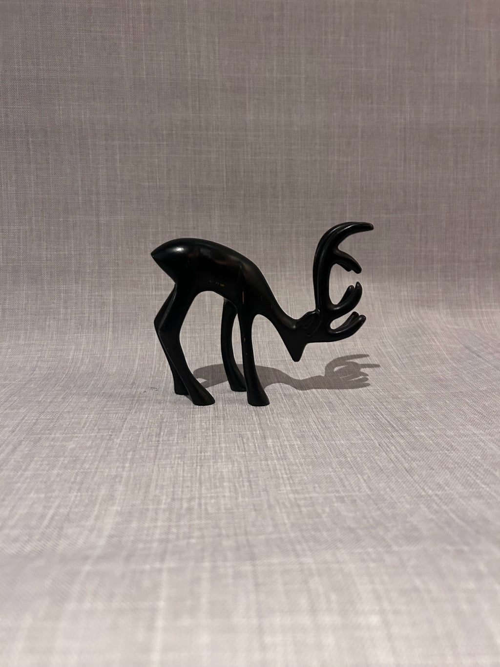 Set of Three Sculptural Black Deer Figures, Mid-Century Modern Scandinavian-Inspired Decorative Objects