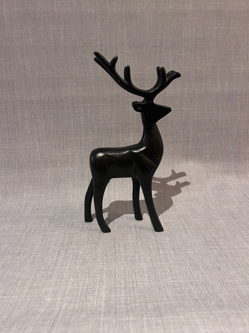 Set of Three Sculptural Black Deer Figures, Mid-Century Modern Scandinavian-Inspired Decorative Objects