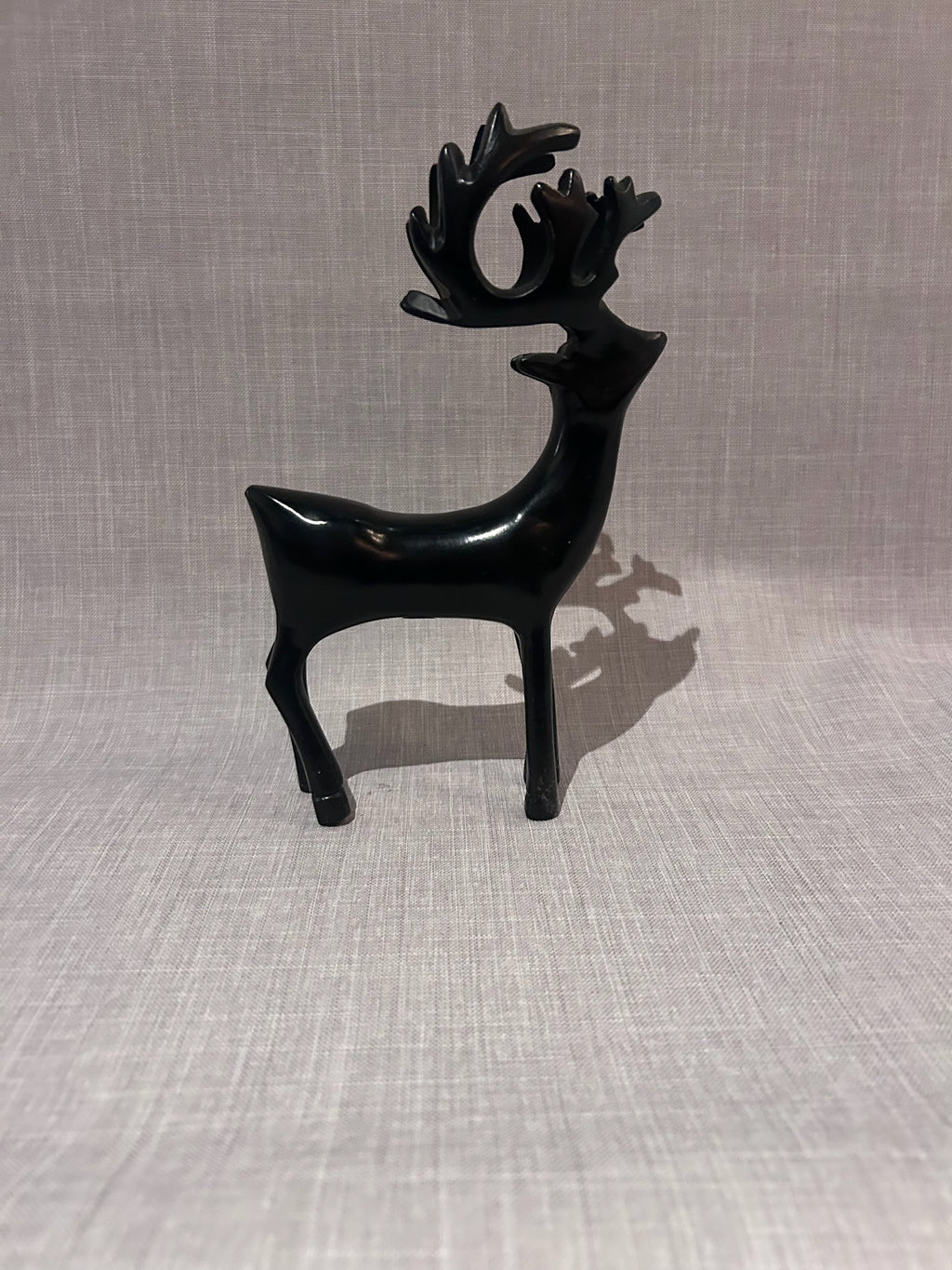 Set of Three Sculptural Black Deer Figures, Mid-Century Modern Scandinavian-Inspired Decorative Objects