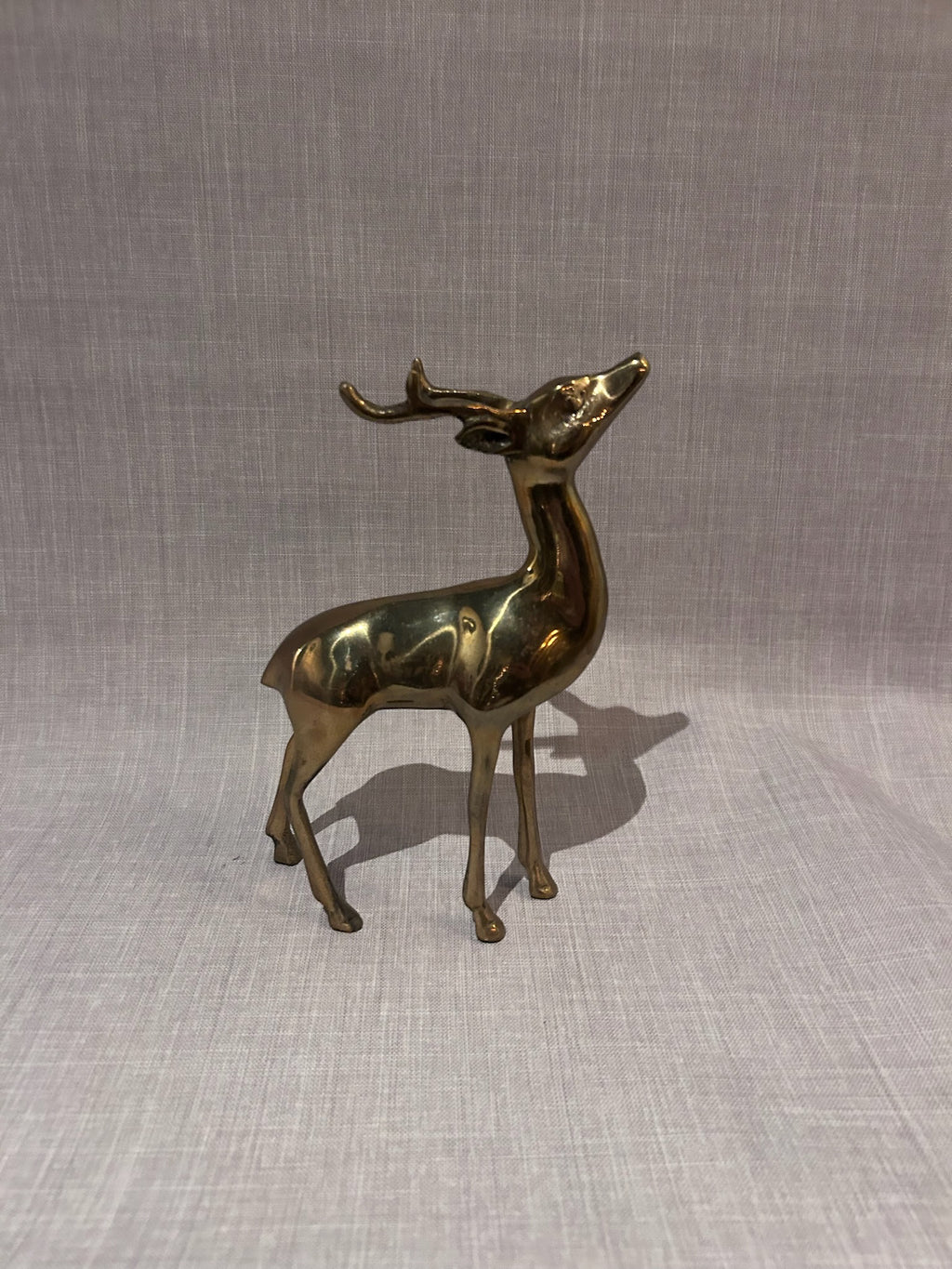 Exceptional Mid-Century Modern Solid Brass Deer Sculptures, Elegant Buck and Grazing Doe Figurines, Refined Modernist Animal Forms