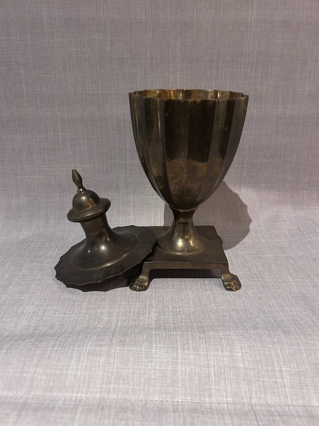 vintage brass urn with paw feet monumental decor piece