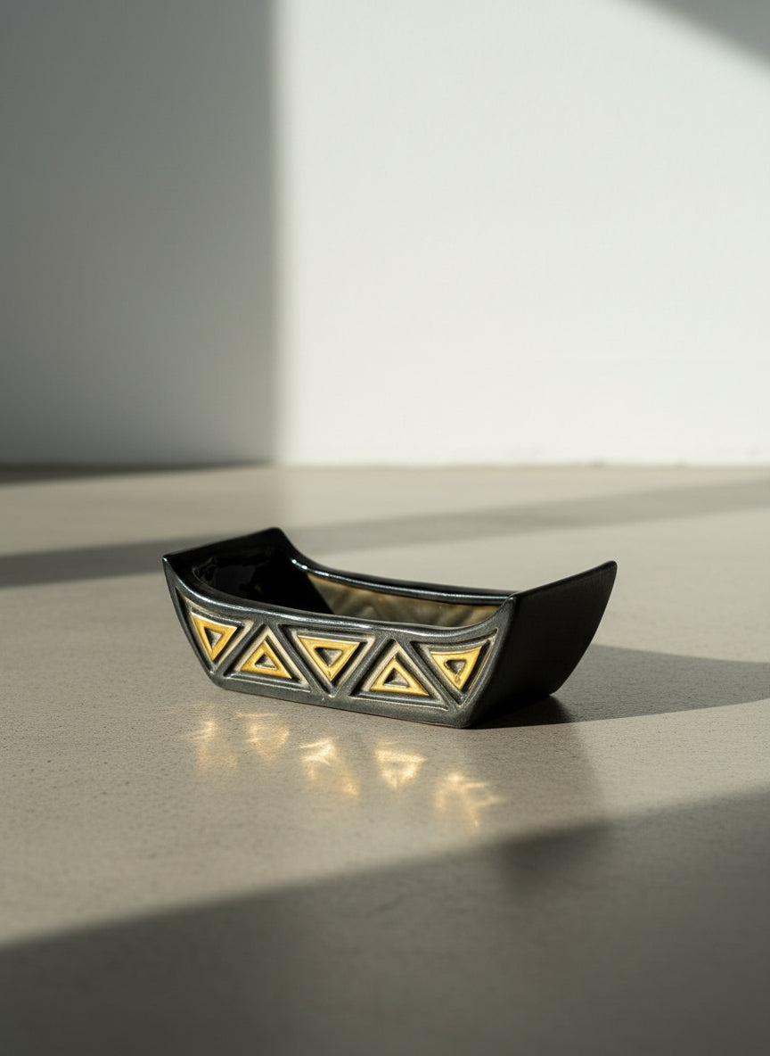 Mid-Century Black Ceramic Canoe Planter with Raised Mustard Geometric Triangles