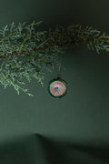 Mid-Century Hand-Blown Green Reflector Glass Ornament with Multicolor Starburst Lens, c. 1940–1960