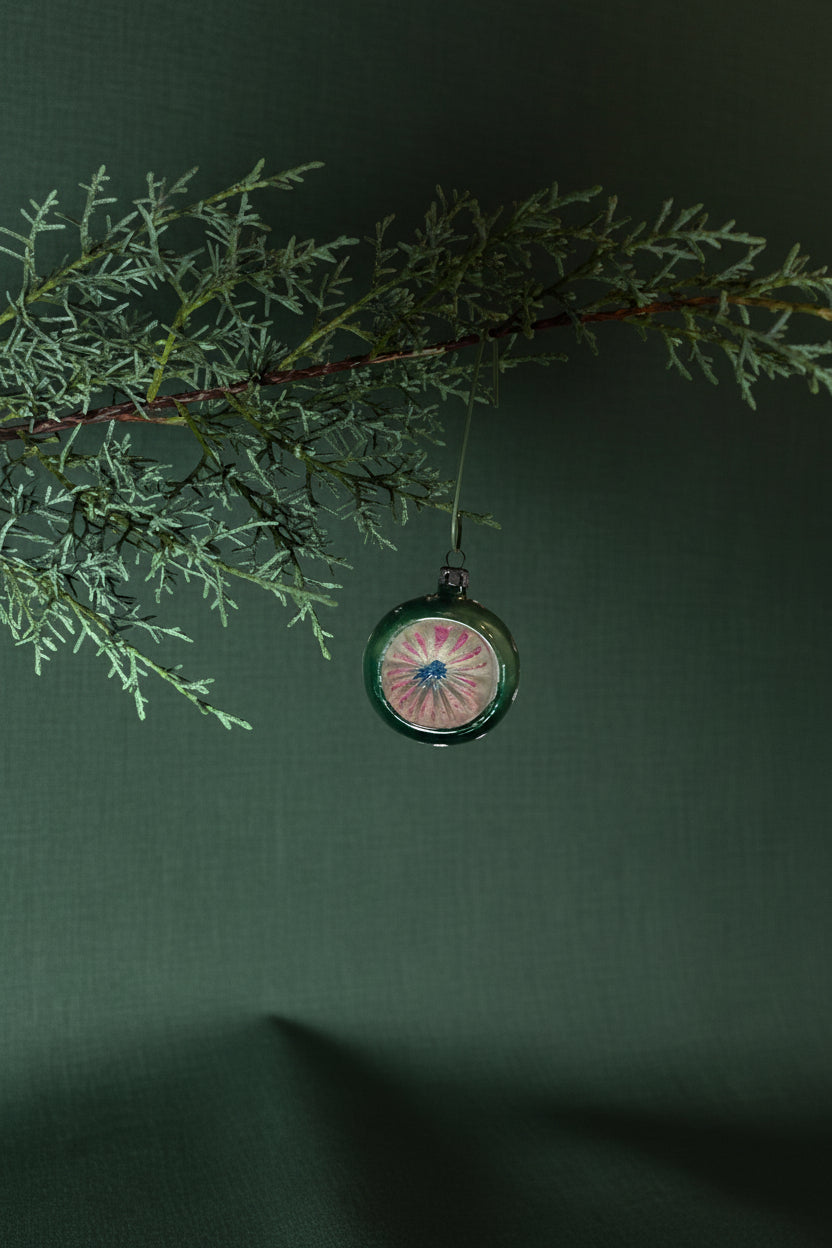 Mid-Century Hand-Blown Green Reflector Glass Ornament with Multicolor Starburst Lens, c. 1940–1960