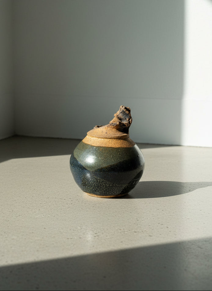 Sculptural Studio Pottery Vessel by Sadek – Textured Black and Earth-Toned Abstract Ceramic Form