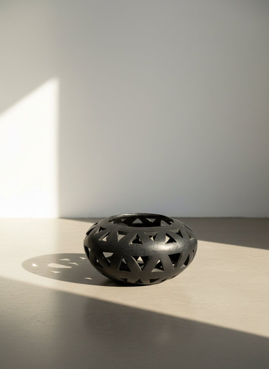 vintage black pierced geometric pottery bowl