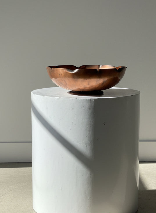 Vintage Egidio Casagrande Hand-Hammered Copper Bowl on display, showcasing signature texture and scalloped rim. hommes + gardens estudio.