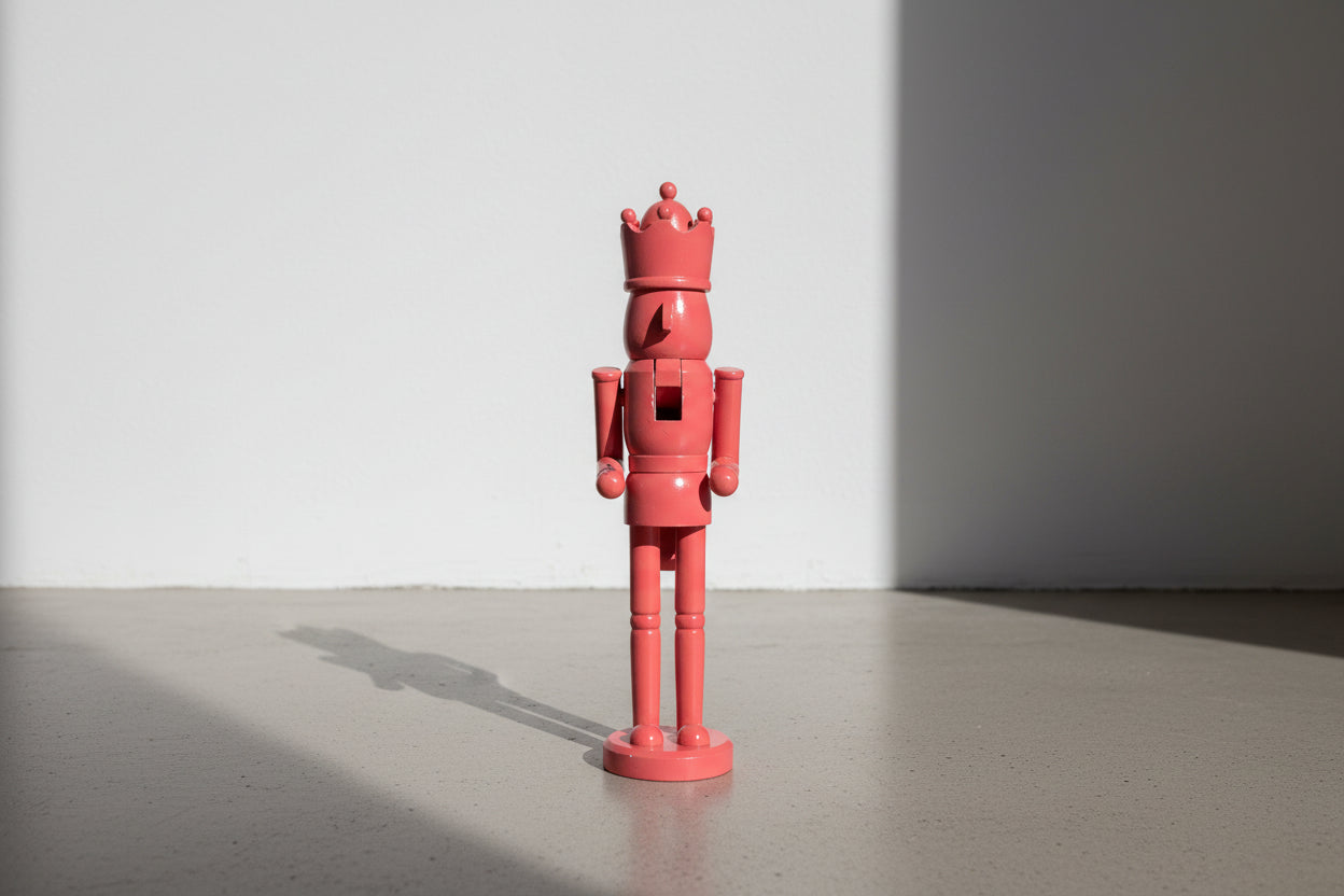 Vintage Hand-Painted Wooden Nutcracker King Sculpture in Coral Pink, Folk Art Decorative Figure