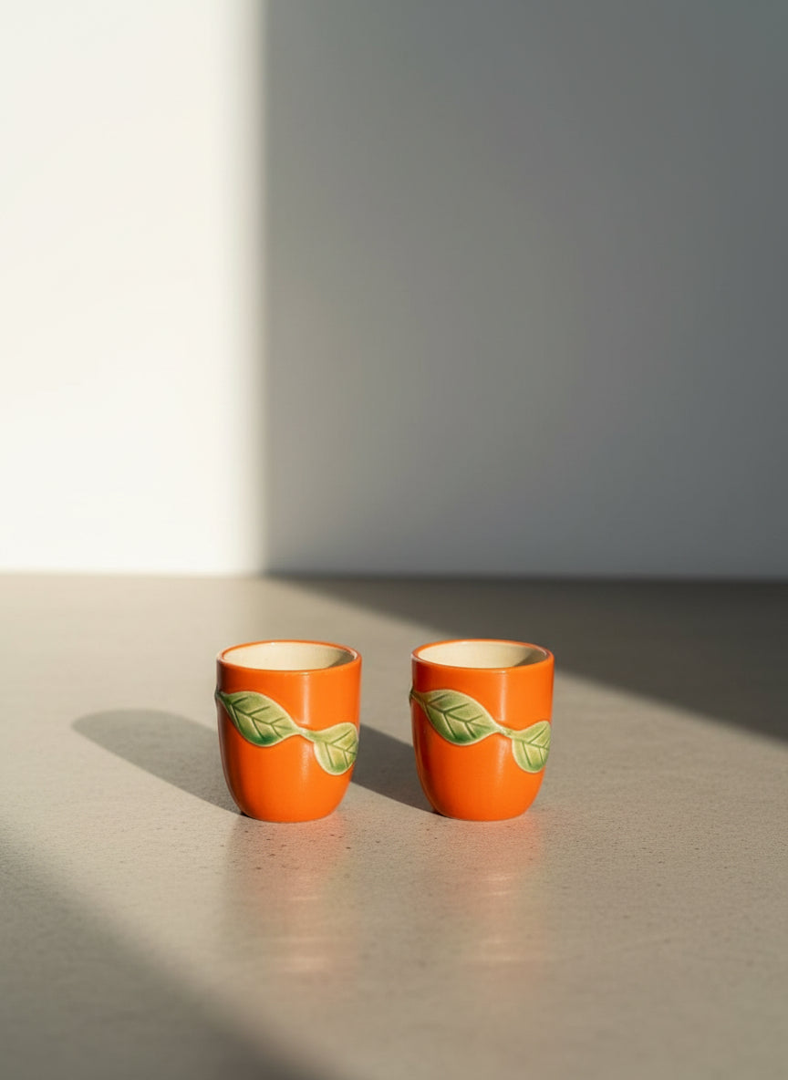 Vintage Japanese Orange Ceramic Mini Cups with Raised Green Leaf Accents – Set of 2