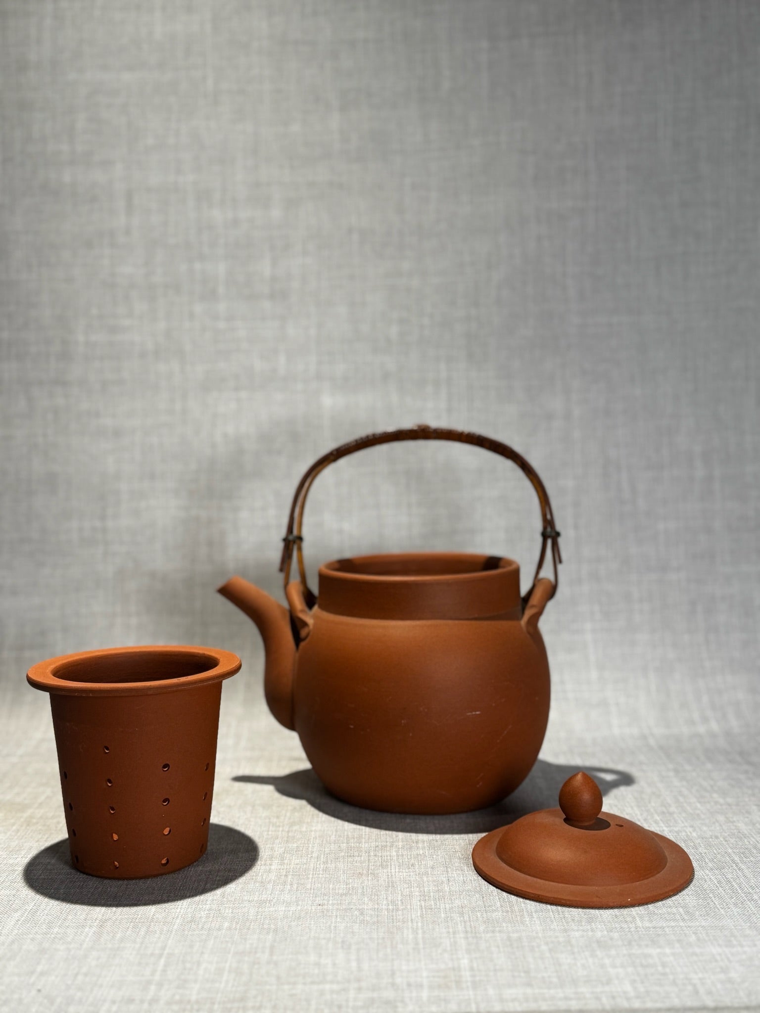 Vintage Japanese Unglazed Terracotta Teapot with Bamboo Handle and Removable Tea Strainer