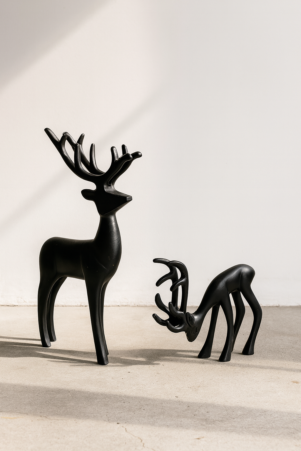Elegant Mid-Century Modern Black Deer Sculptures – Stylized Minimalist Reindeer Pair