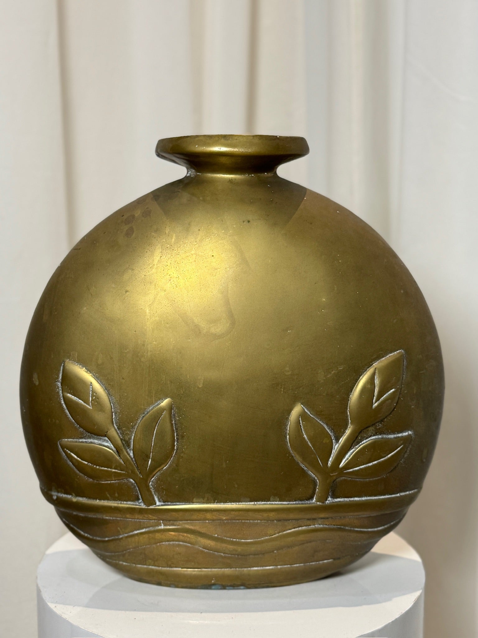 1980s Dolbi Cashier brass vase featuring embossed floral and wave motifs, Art Deco revival design with rounded silhouette and elegant aged patina — Hommes and Gardens, Vases + Vessels Collection, Landscape Architect, Interior Designer, Outdoor Living, Art, Furniture, Objects, Best Gifts, Nature, Backyard, Yard, Outdoor Decorations, Home Decor, Home Design, Luxury Design.
