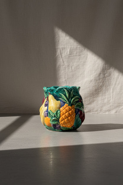 1990s vibrant glazed and painted ceramic fruit jar vase signed by the artist, featuring stacked fruit design with pineapple, pear, and lettuce leaf lip — Hommes and Gardens, Vases + Vessels Collection, Landscape Architect, Interior Designer, Outdoor Living, Art, Furniture, Objects, Best Gifts, Nature, Backyard, Yard, Outdoor Decorations, Home Decor, Home Design, Luxury Design.