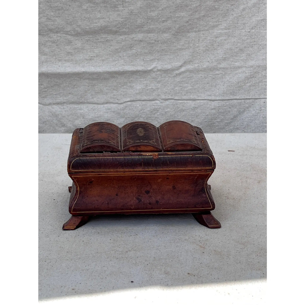 19th century small leather-wrapped jewelry box with gilded iron accents and exotic wood legs, showcasing fine craftsmanship and antique charm — Hommes and Gardens, Objects Collection, Landscape Architect, Interior Designer, Outdoor Living, Art, Furniture, Objects, Best Gifts, Nature, Backyard, Yard, Outdoor Decorations, Home Decor, Home Design, Luxury Design.