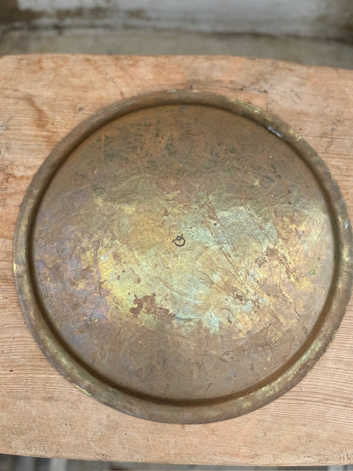 hammered brass serving tray detailed engraving close up