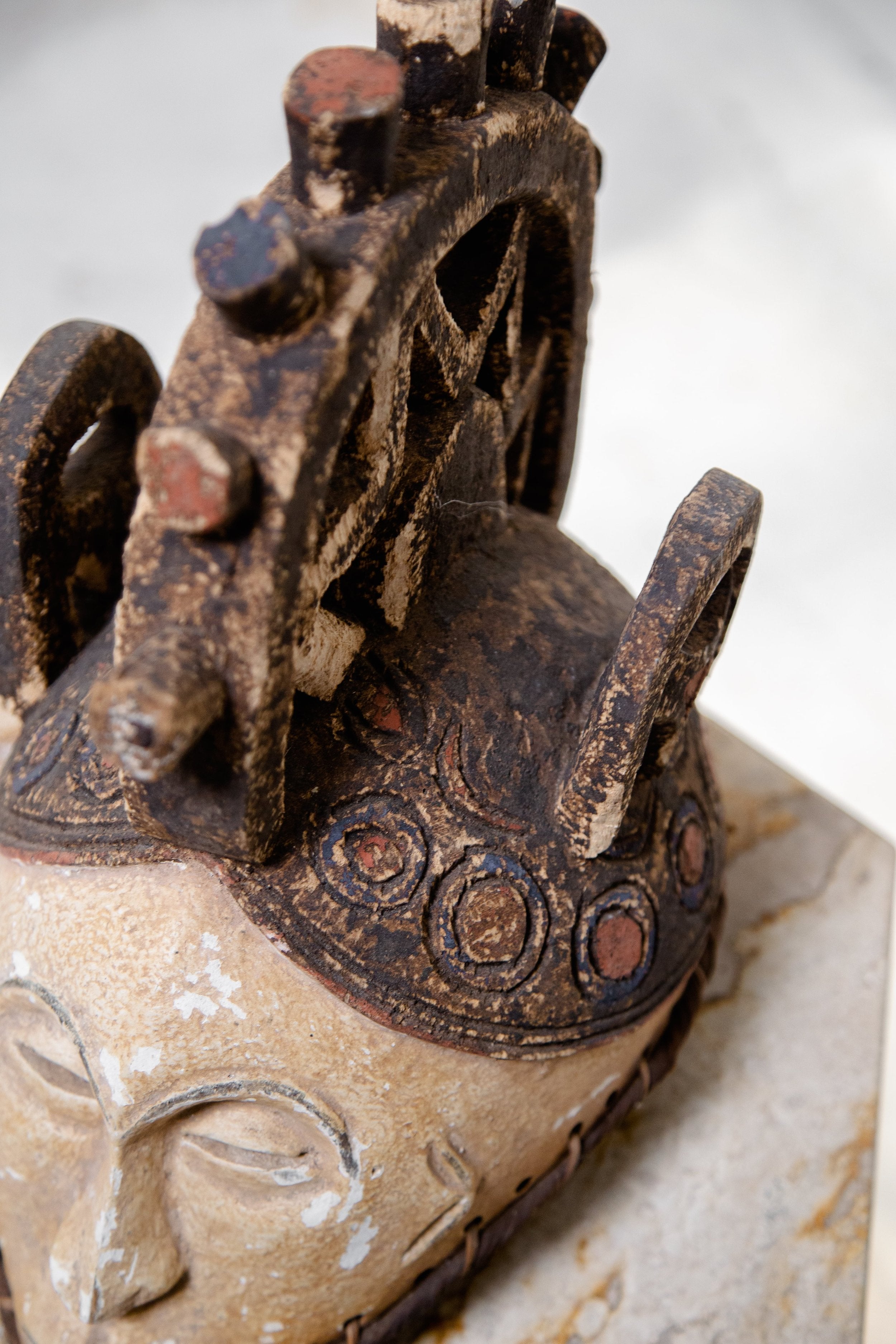 African Igbo mask from the 19th century, made of wood, paint, and dyed fabric, a genuine antique artifact of Nigerian art — Hommes and Gardens, Objects Collection, home decor, outdoor decorations, home design, luxury design, Landscape Architect, Interior Designer, Outdoor Living, Art, Furniture, Objects, Best Gifts, Nature, Backyard, Yard.