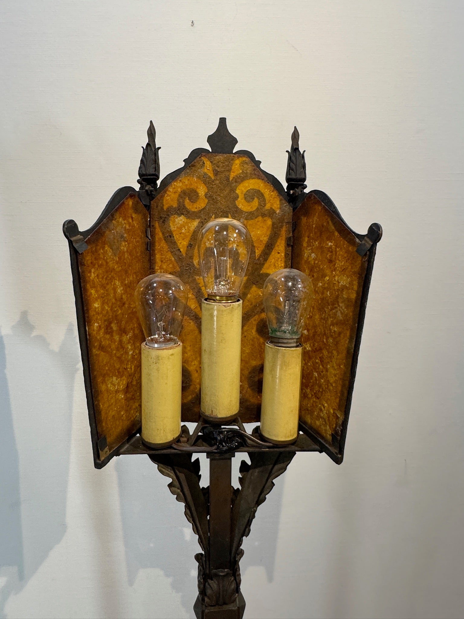 Amber mica shade floor lamps crafted in wrought iron with scrollwork details, vintage lighting accent for timeless interior style — Hommes and Gardens, Lights + Lanterns Collection, Landscape Architect, Interior Designer, Outdoor Living, Art, Furniture, Objects, Best Gifts, Nature, Backyard, Yard, Outdoor Decorations, Home Decor, Home Design, Luxury Design.