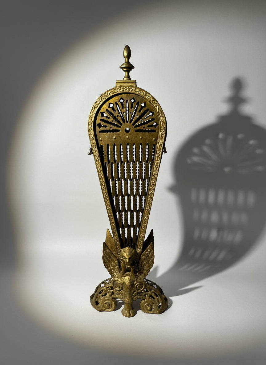 Antique Brass Griffin & Peacock Folding Fire Guard – Edwardian Fireplace c.1900s showcasing intricate sunburst design. hommes + gardens estudio