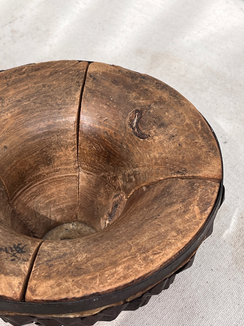 close-up texture of wooden bowl with natural hide surface handmade detail