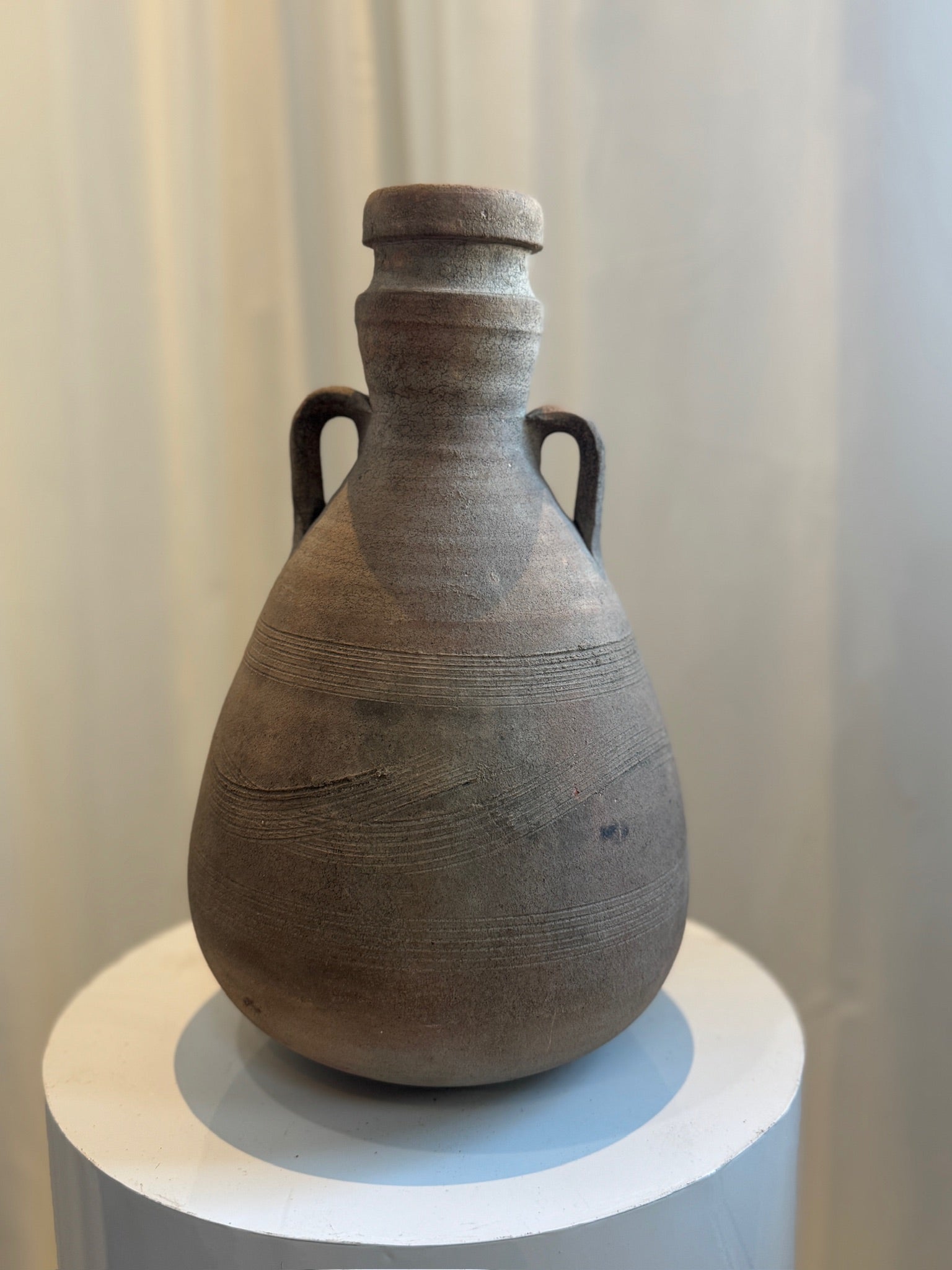 Antique Classical Roman terracotta amphora featuring gracefully curved handles, aged patina, and finely incised ridges, perfect for historical decor — Hommes and Gardens, Vases + Vessels Collection, Landscape Architect, Interior Designer, Outdoor Living, Art, Furniture, Objects, Best Gifts, Nature, Backyard, Yard, Outdoor Decorations, Home Decor, Home Design, Luxury Design.