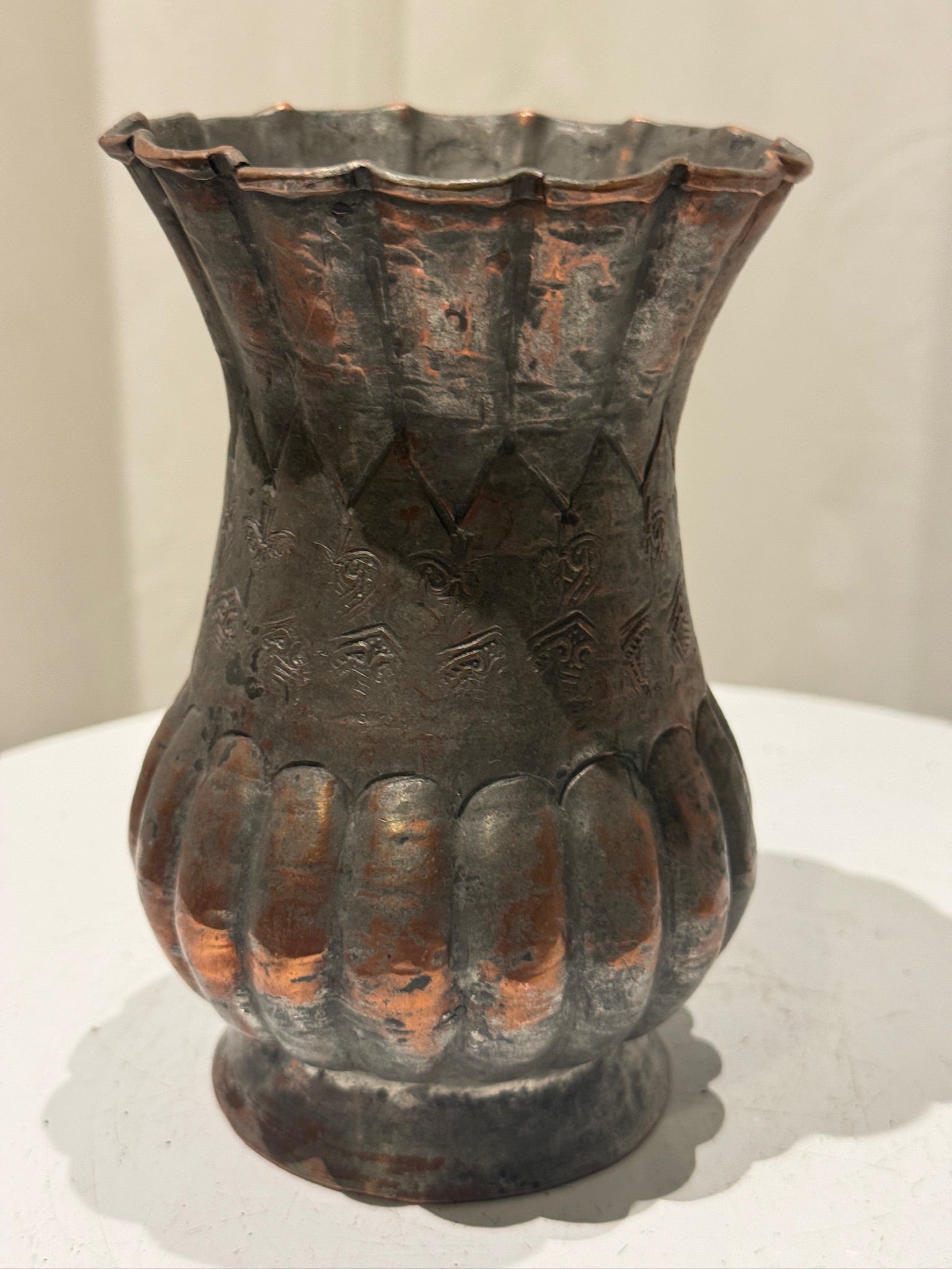 Antique Egyptian copper vase handcrafted with detailed floral engravings and fluted bulbous body, stamped “Egypt” and finished with graceful patina — Hommes and Gardens, Vases + Vessels Collection, Landscape Architect, Interior Designer, Outdoor Living, Art, Furniture, Objects, Best Gifts, Nature, Backyard, Yard, Outdoor Decorations, Home Decor, Home Design, Luxury Design.