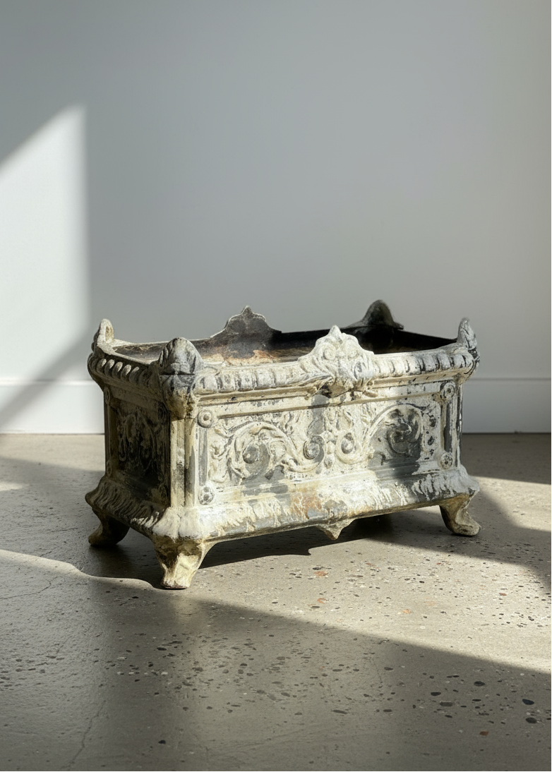 Antique French cast iron garden urn planter with ornate detailing, clawed feet, and aged patina, a 19th-century Rococo-inspired decorative piece of timeless European elegance — Hommes and Gardens, Pots + Vessels Collection, Garden Decor, Landscape Architect, Interior Designer, Outdoor Living, Outdoor Decorations, Home Design, Luxury Design, Art, Furniture, Objects, Best Gifts, Nature, Backyard, Yard.