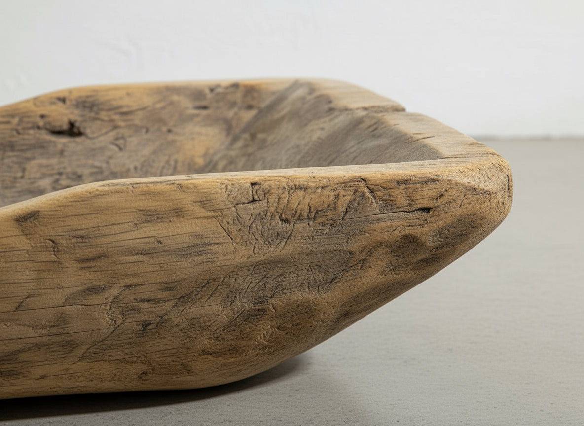 Antique Hand-Carved Wooden Dough Bowl – Rustic Primitive Trencher with Aged Repairs close-up view showing its detailed craftsmanship. hommes + gardens estudio