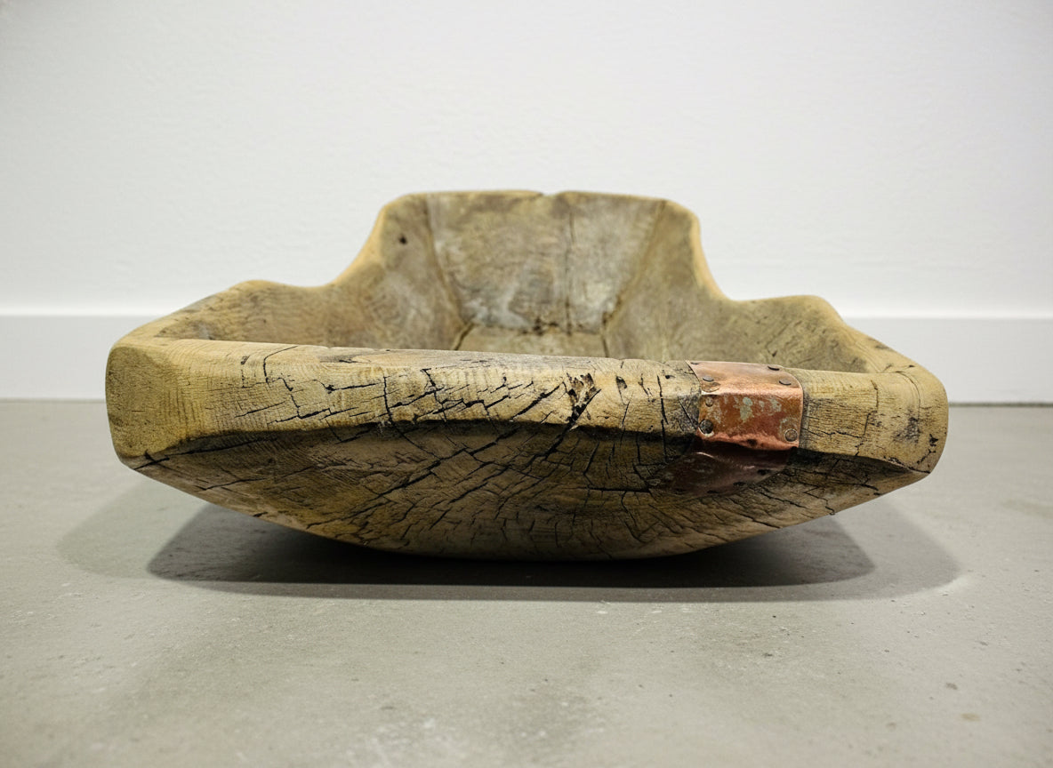 Antique Hand-Carved Wooden Dough Bowl – Rustic Primitive Trencher with Aged Repairs, showing unique craftsmanship and rustic charm. hommes + gardens estudio