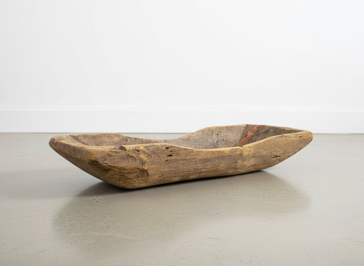 Antique Hand-Carved Wooden Dough Bowl – Rustic Primitive Trencher with Aged Repairs on a neutral background. hommes + gardens estudio.