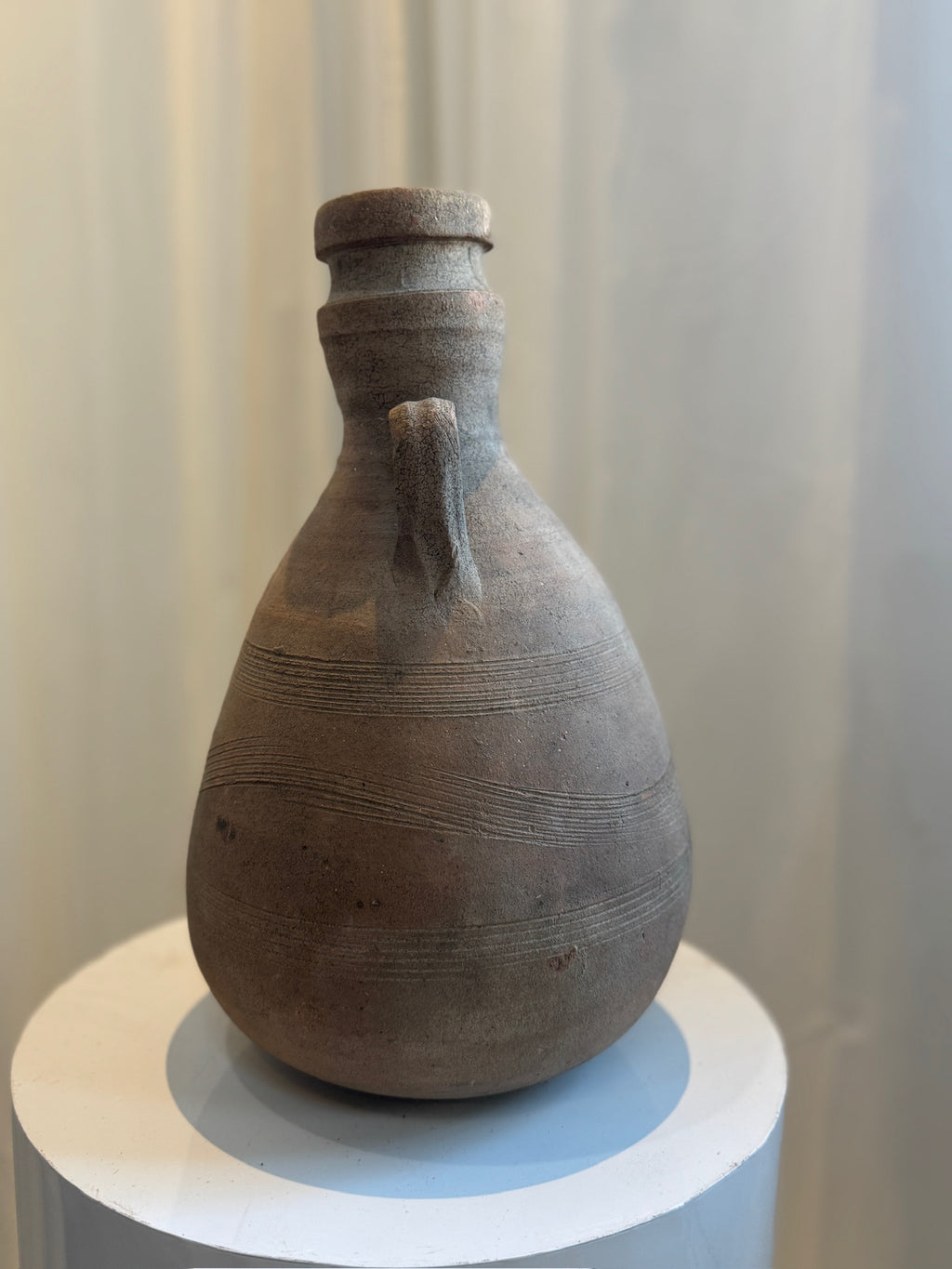 Antique handmade terracotta amphora inspired by Roman Empire pottery, with ribbed texture and aged finish, ideal for collectors and designers — Hommes and Gardens, Vases + Vessels Collection, Landscape Architect, Interior Designer, Outdoor Living, Art, Furniture, Objects, Best Gifts, Nature, Backyard, Yard, Outdoor Decorations, Home Decor, Home Design, Luxury Design.