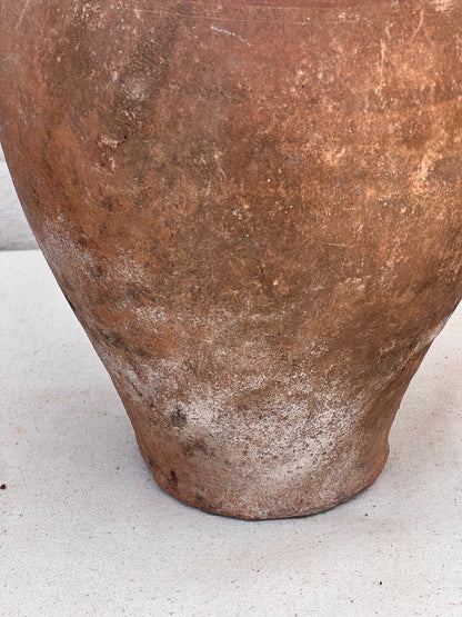 Antique handmade terracotta vessel with wabi-sabi texture, earthy tones, and natural imperfections reflecting authentic artisanal beauty — Hommes and Gardens, Vases + Vessels Collection, Landscape Architect, Interior Designer, Outdoor Living, Art, Furniture, Objects, Best Gifts, Nature, Backyard, Yard, Outdoor Decorations, Home Decor, Home Design, Luxury Design.