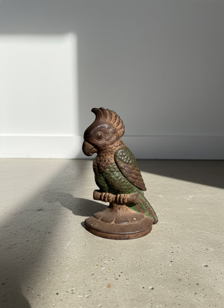 Antique Hubley cast iron parrot doorstop with original hand-painted green, red, and brown finish, early 20th-century collectible crafted in the USA — Hommes and Gardens, Landscape Architect, Interior Designer, Outdoor Living, Art, Furniture, Objects, Best Gifts, Nature, Backyard, Yard, Outdoor Decorations, Home Decor, Home Design, Luxury Design.