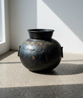Antique iron pot with rustic aged patina, ideal as a decorative planter or vessel for gardens or interiors, combining timeless craftsmanship with vintage appeal — Hommes and Gardens, Pots + Vessels Collection, Garden Decor, Landscape Architect, Interior Designer, Outdoor Living, Outdoor Decorations, Home Design, Luxury Design, Art, Furniture, Objects, Best Gifts, Nature, Backyard, Yard.
