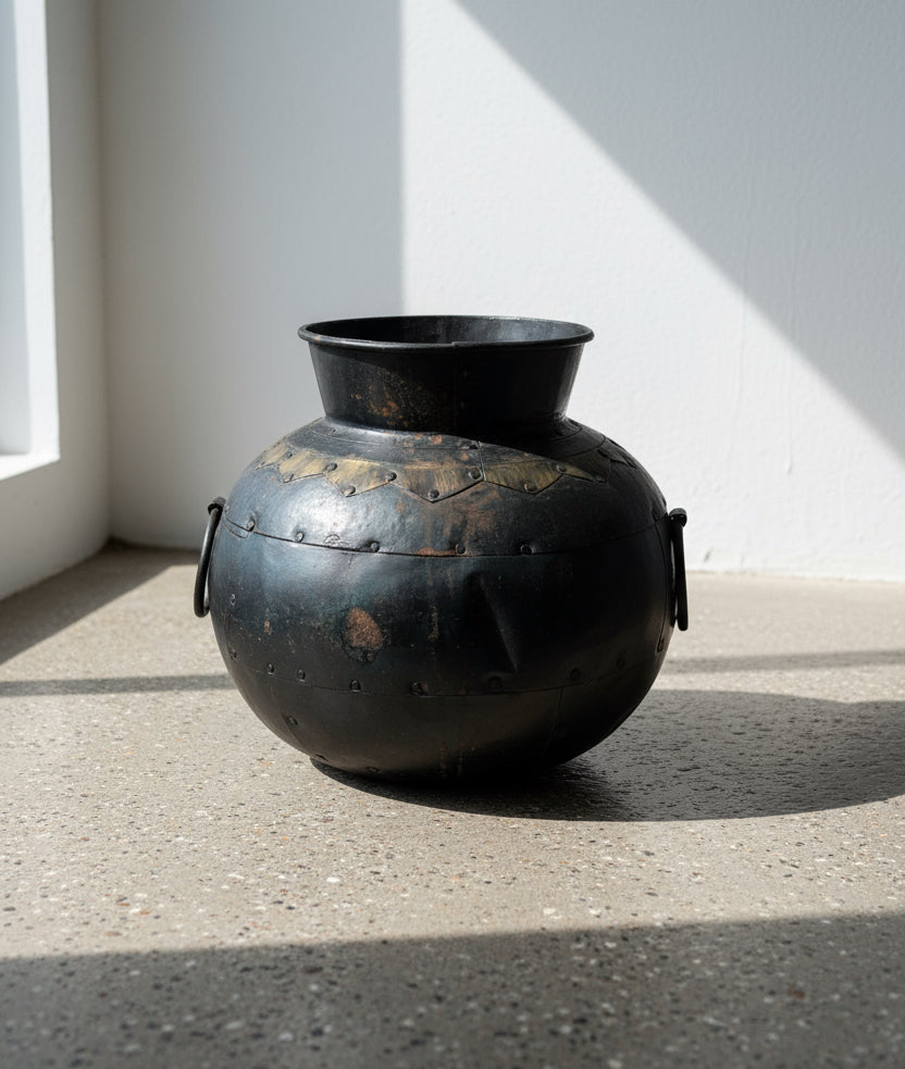 Antique iron pot with rustic aged patina, ideal as a decorative planter or vessel for gardens or interiors, combining timeless craftsmanship with vintage appeal — Hommes and Gardens, Pots + Vessels Collection, Garden Decor, Landscape Architect, Interior Designer, Outdoor Living, Outdoor Decorations, Home Design, Luxury Design, Art, Furniture, Objects, Best Gifts, Nature, Backyard, Yard.