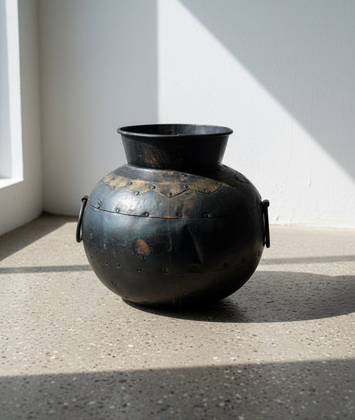 Antique iron pot with rustic aged patina, ideal as a decorative planter or vessel for gardens or interiors, combining timeless craftsmanship with vintage appeal — Hommes and Gardens, Pots + Vessels Collection, Garden Decor, Landscape Architect, Interior Designer, Outdoor Living, Outdoor Decorations, Home Design, Luxury Design, Art, Furniture, Objects, Best Gifts, Nature, Backyard, Yard.