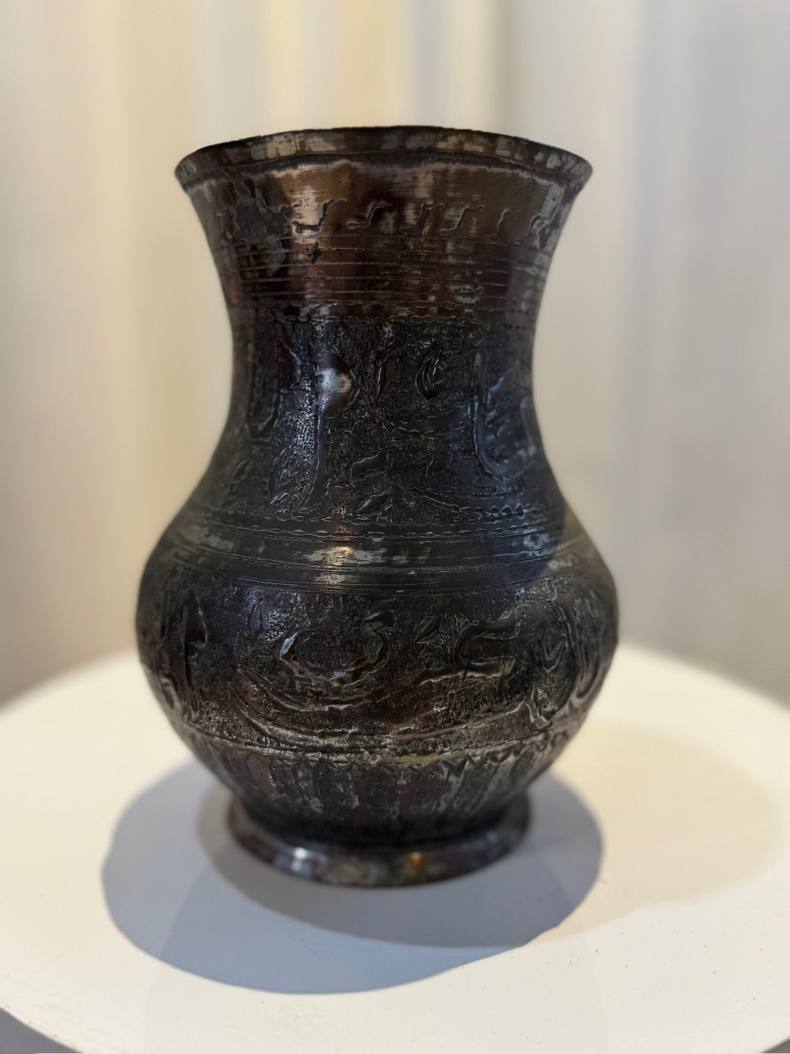 Antique Middle Eastern hand-engraved copper pitcher featuring Arabic calligraphy and ornate Islamic motifs, aged patina and curved handle, a cultural collectible — Hommes and Gardens, Culinaria Collection, Landscape Architect, Interior Designer, Outdoor Living, Art, Furniture, Objects, Best Gifts, Nature, Backyard, Yard, Outdoor Decorations, Home Decor, Home Design, Luxury Design.