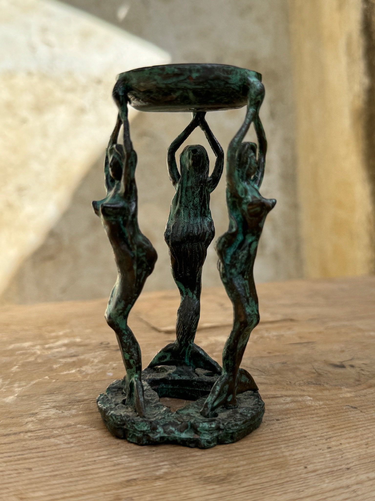 Patina mermaids Candle Holders and Incense Burner featuring intricate mermaid designs and a vintage patina finish. hommes + gardens estudio.
