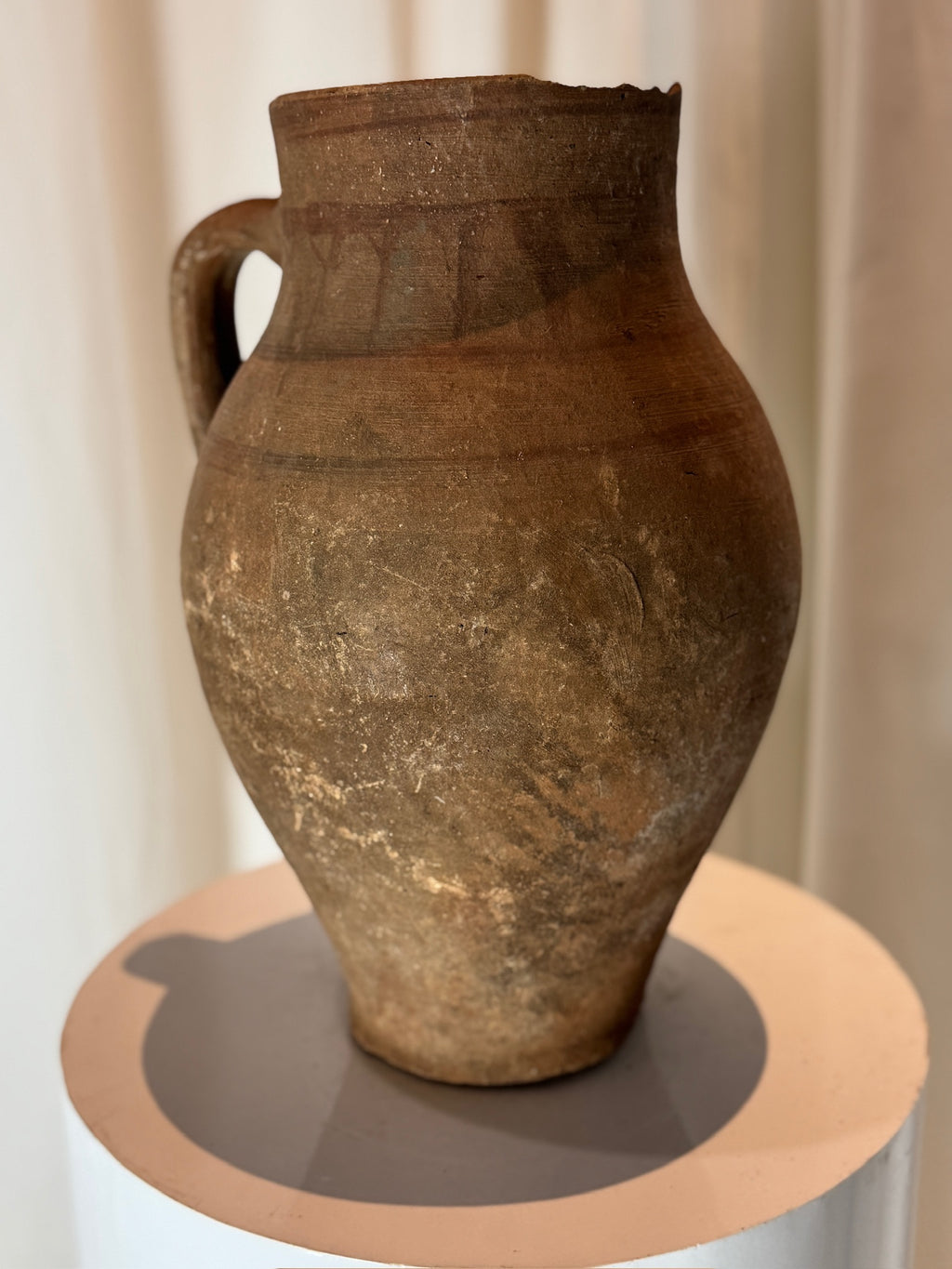 Antique rustic terracotta pottery water jug with sturdy handle and organic form, an earthy collectible adding warmth and history to any décor — Hommes and Gardens, Vases + Vessels Collection, Landscape Architect, Interior Designer, Outdoor Living, Art, Furniture, Objects, Best Gifts, Nature, Backyard, Yard, Outdoor Decorations, Home Decor, Home Design, Luxury Design.