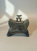 Unique Modern Asian-Inspired Ceramic Headrest Sculpture with Removable Top - intricate design and rich patina. hommes + gardens estudio.