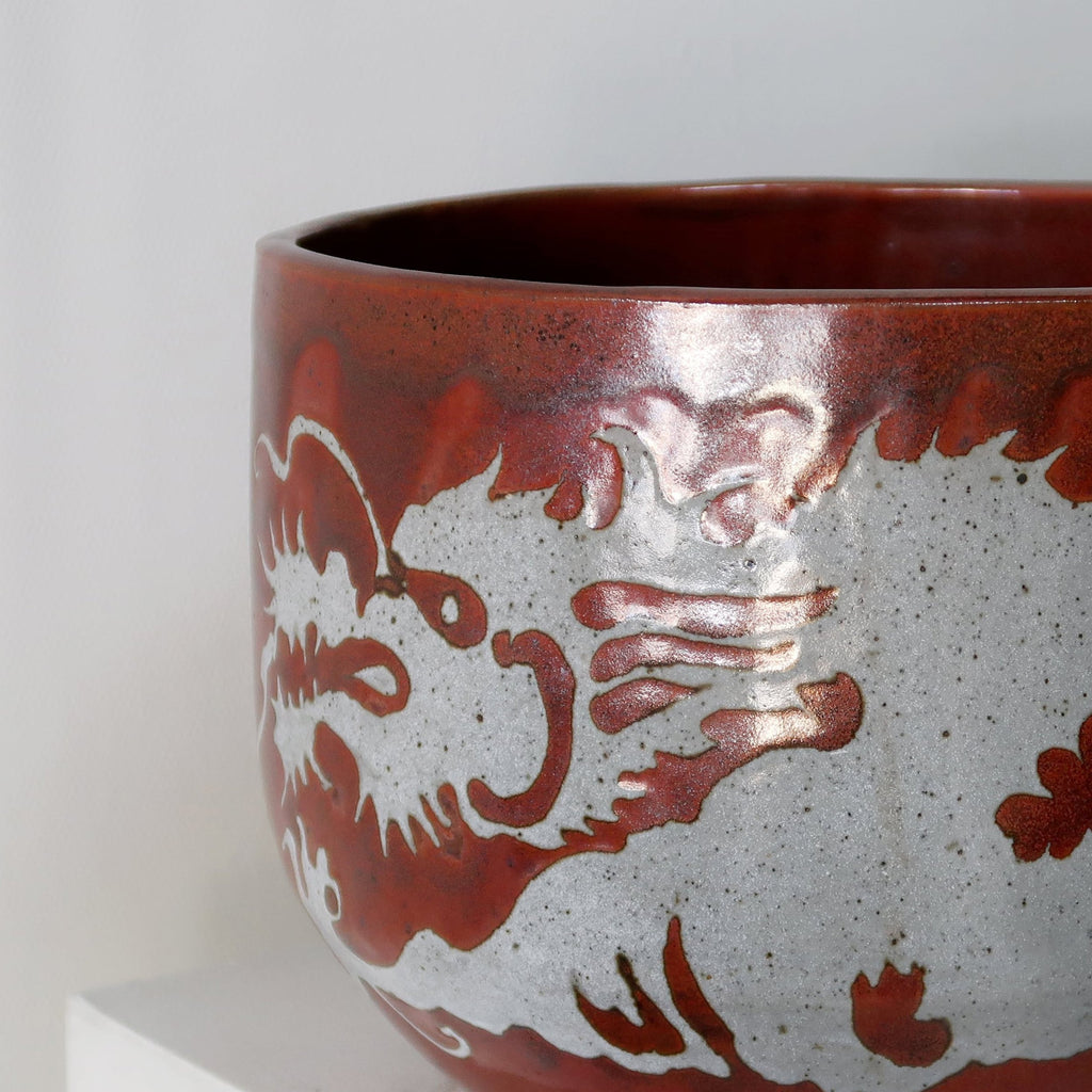 Asian style ceramic pot by Gay Schempp, signed maroon pottery with intricate gray Asian characters, combining artistry and function — Hommes and Gardens, home decor, outdoor decorations, home design, luxury design, Landscape Architect, Interior Designer, Outdoor Living, Art, Furniture, Objects, Best Gifts, Nature, Backyard, Yard.