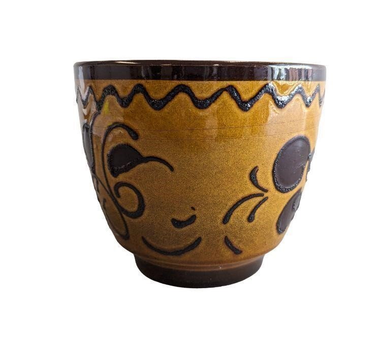 Bay Keramik West German mid-century modern planter with signature Fat Lava glaze, textured surface, and sculptural vintage form — Hommes and Gardens, Pots + Vessels Collection, Landscape Architect, Interior Designer, Outdoor Living, Outdoor Decorations, Home Decor, Home Design, Luxury Design, Art, Furniture, Objects, Best Gifts, Nature, Backyard, Yard.