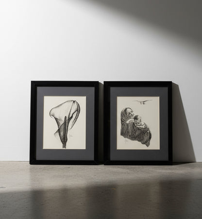 Black and white vintage framed wall art set of two, including a graceful calla lily and tender mother-and-child image — Hommes and Gardens, Wallscape Collection, Wall Art, Vintage Decor, Framed Prints, Monochrome Artwork, Home Styling, Artistic Wall Decor.